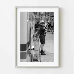 Policeman standing on the street | Wall Art