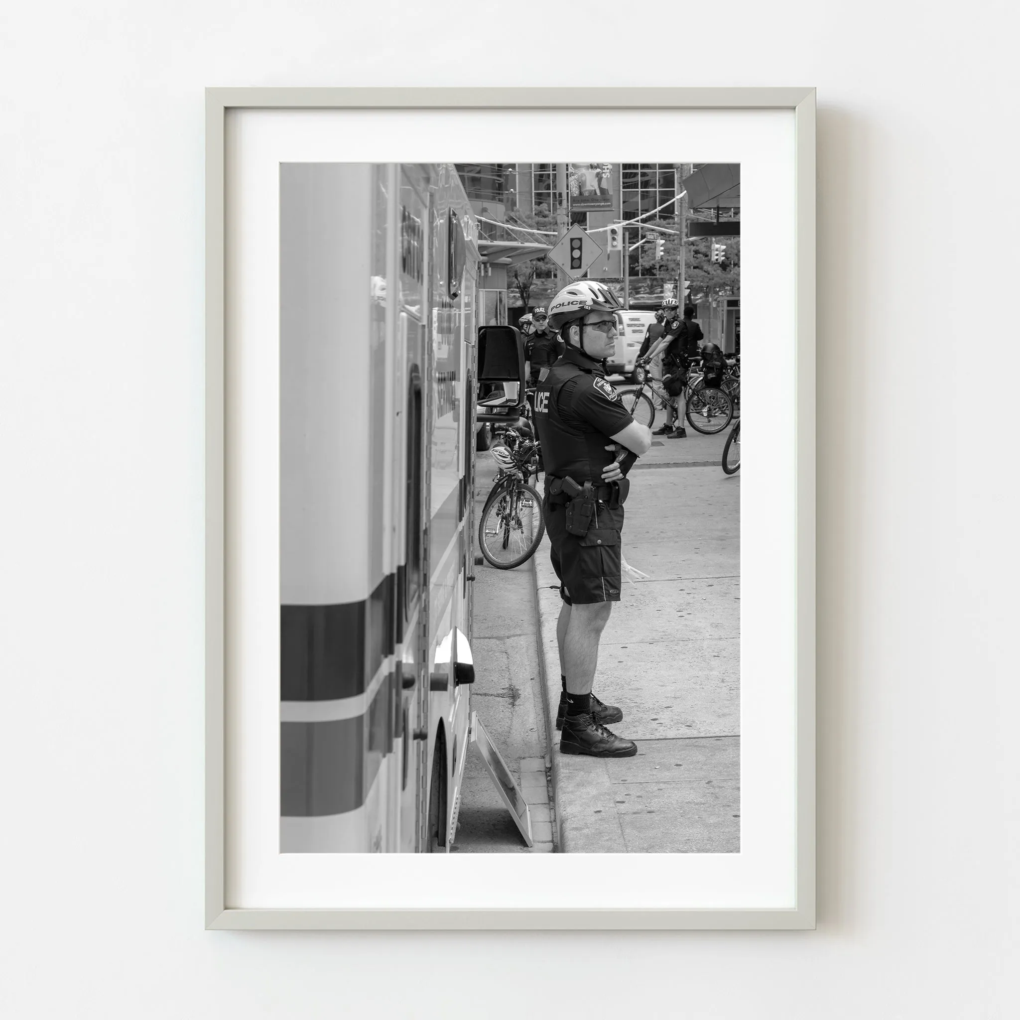 Policeman standing on the street | Wall Art