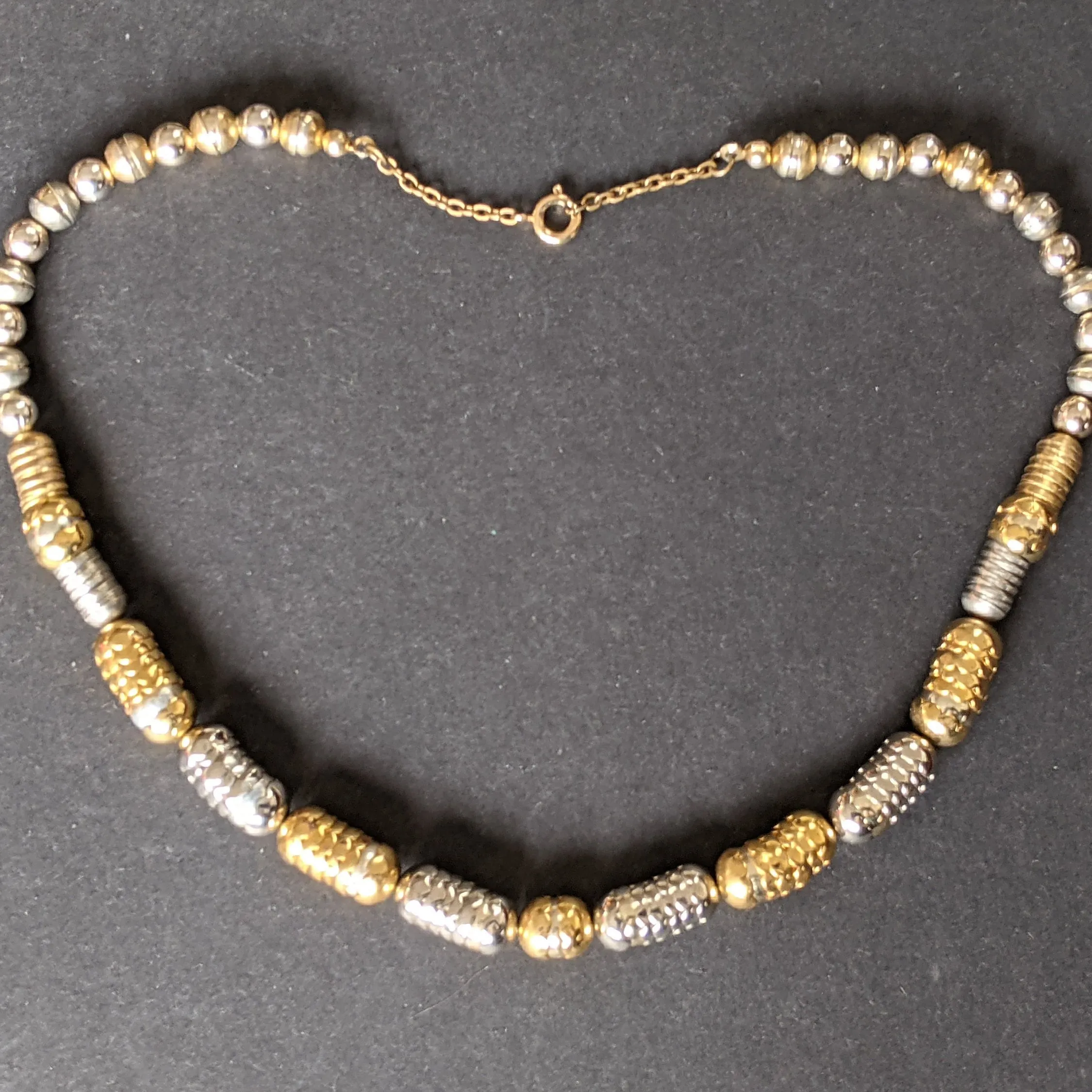 Vintage Jakob Bengel style Art Deco machine age gold and silver tone stacked cup bead geometric statement necklace
