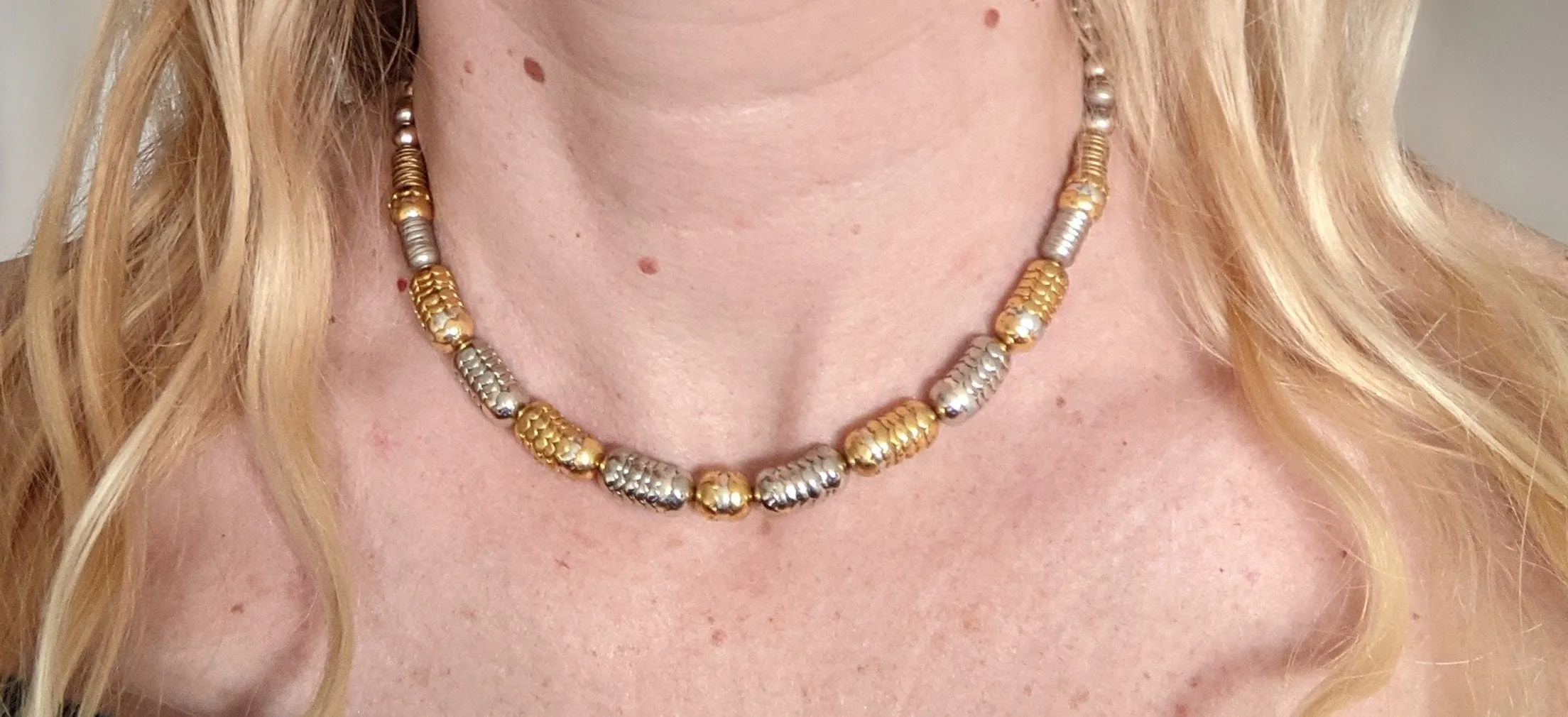 Vintage Jakob Bengel style Art Deco machine age gold and silver tone stacked cup bead geometric statement necklace